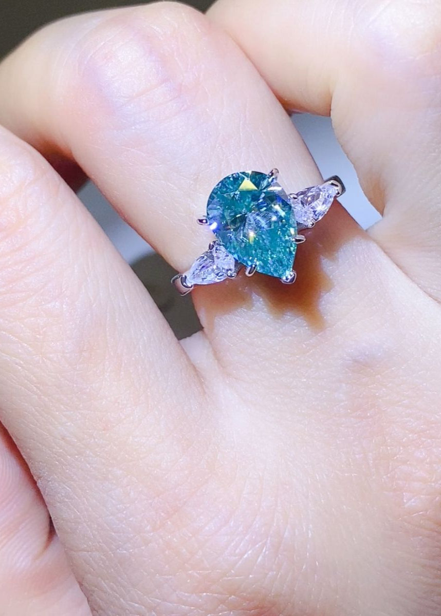 Aqua 2 Carat Pear Cut Moissanite Ring