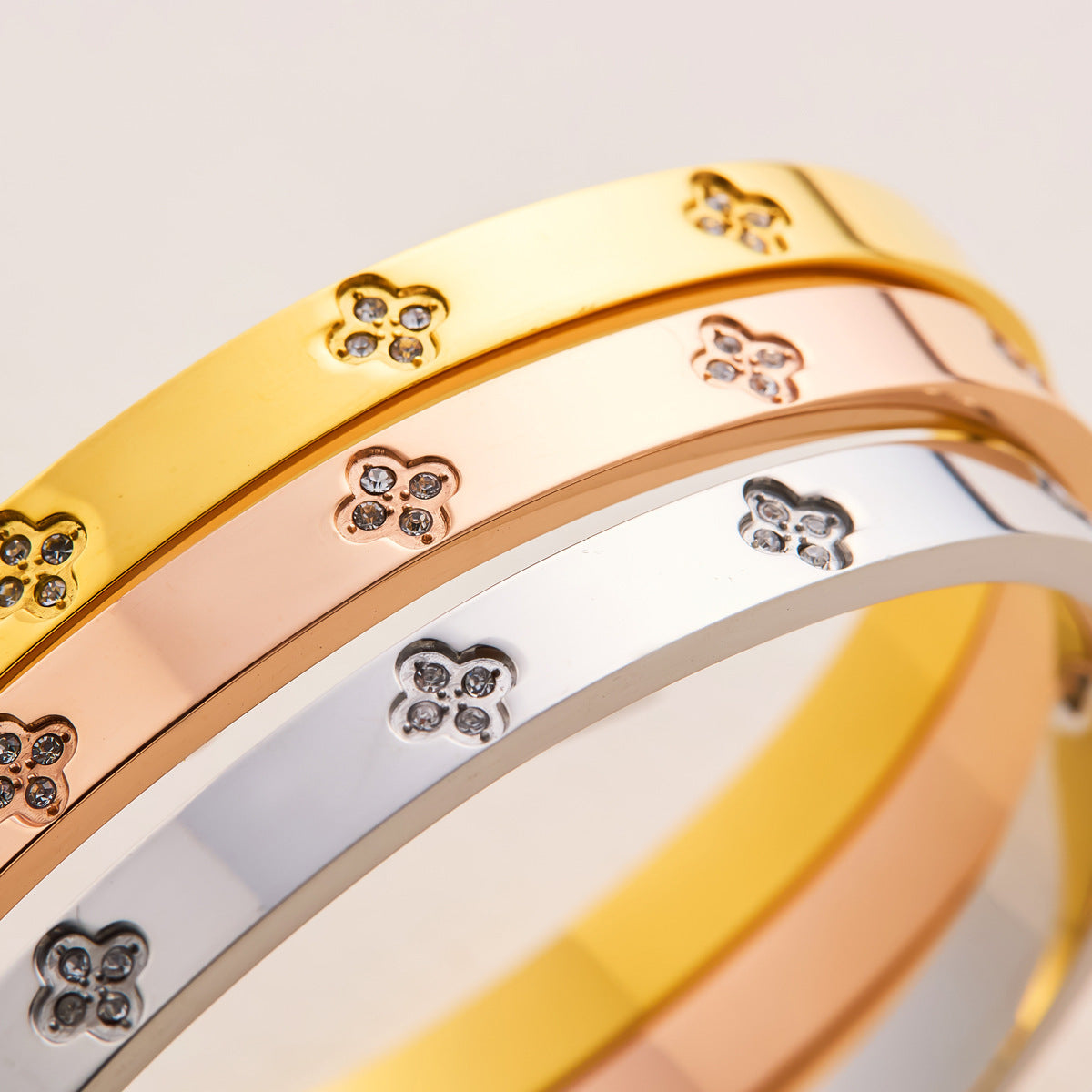 Charm & Dazzle Clover Hinged Bangle Bracelet