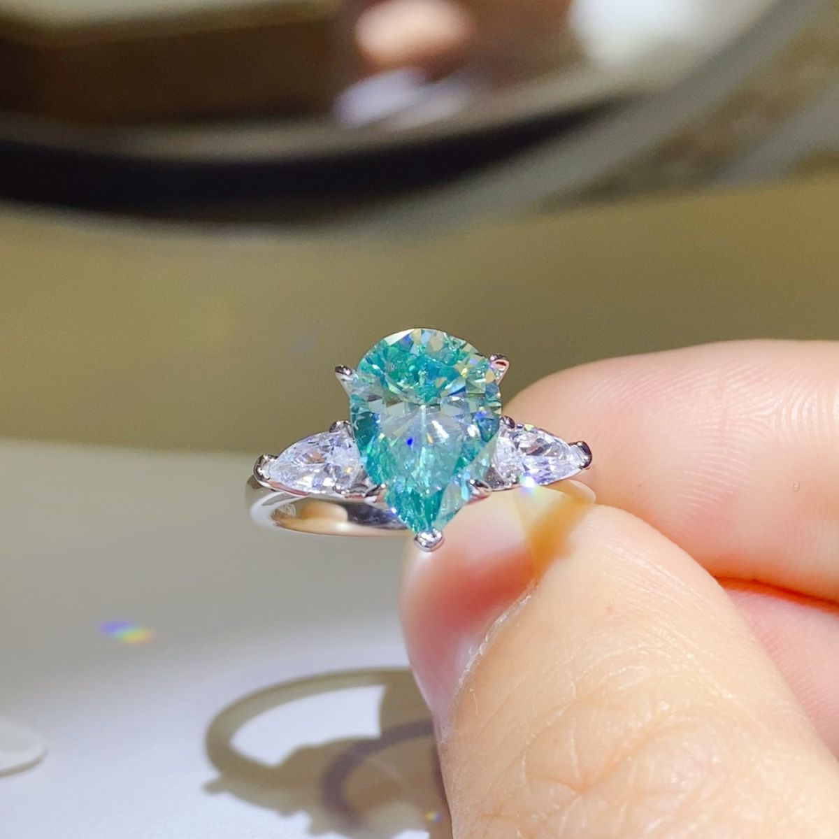 Aqua 2 Carat Pear Cut Moissanite Ring