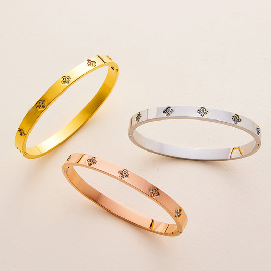 Charm & Dazzle Clover Hinged Bangle Bracelet
