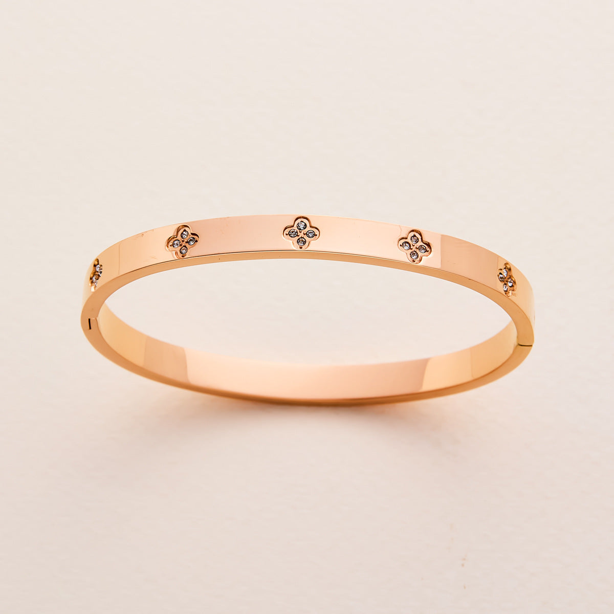 Charm & Dazzle Clover Hinged Bangle Bracelet