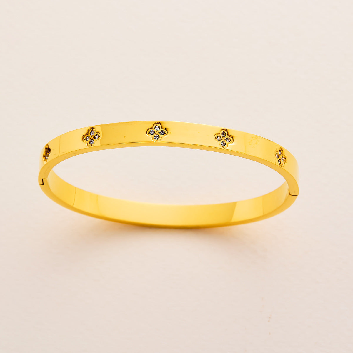 Charm & Dazzle Clover Hinged Bangle Bracelet