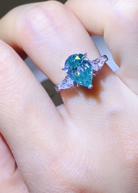 Aqua 2 Carat Pear Cut Moissanite Ring